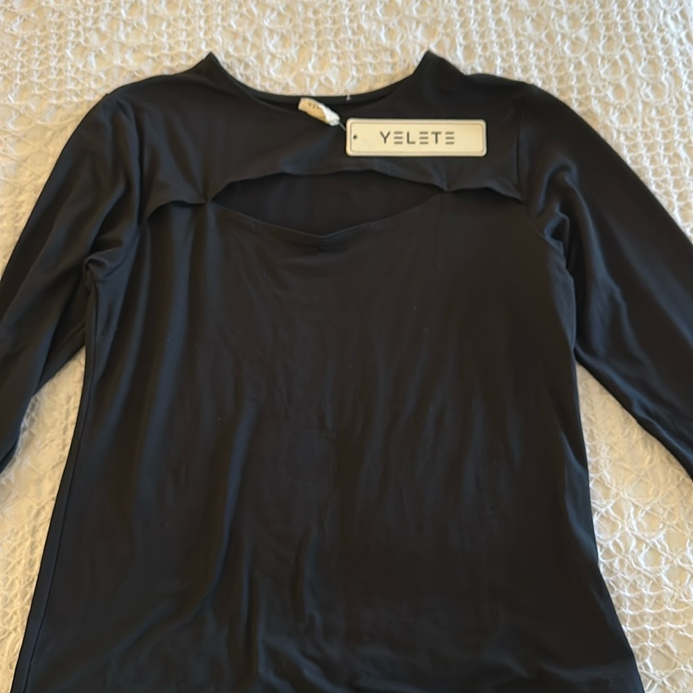 Black long sleeve top with cut out